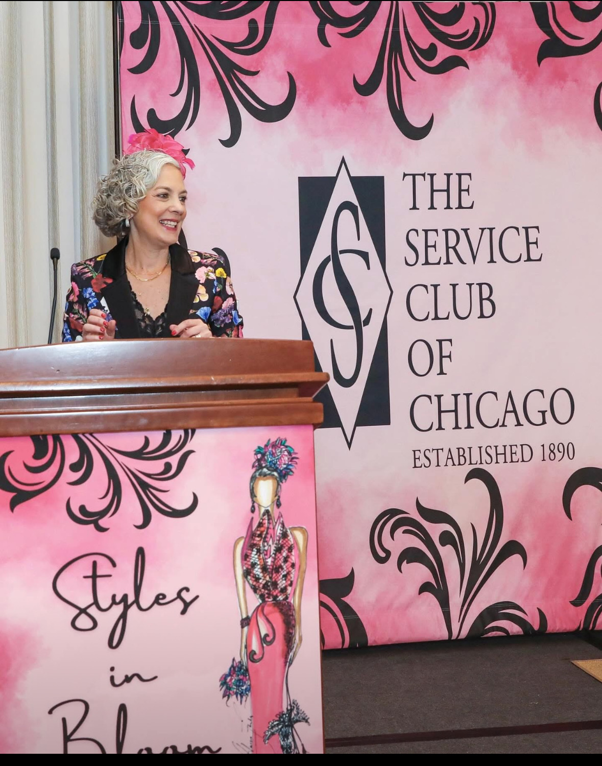 Molly Morse Limmer presiding at the Service Club of Chicago's Styles in Bloom benefit